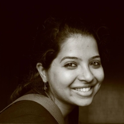 Photo of Shubhi Sachdeva smiling